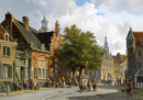 Figures in the Sunlit Streets of a Dutch Town