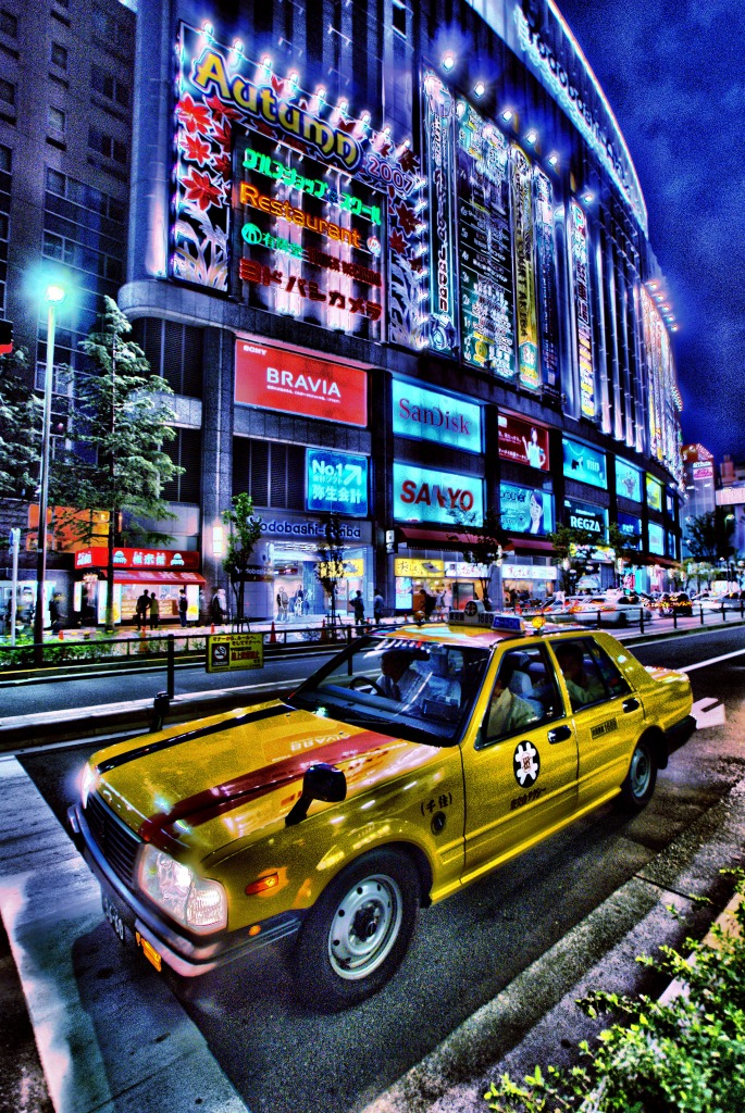Un taxi jigsaw puzzle in Paysages urbains puzzles on TheJigsawPuzzles.com