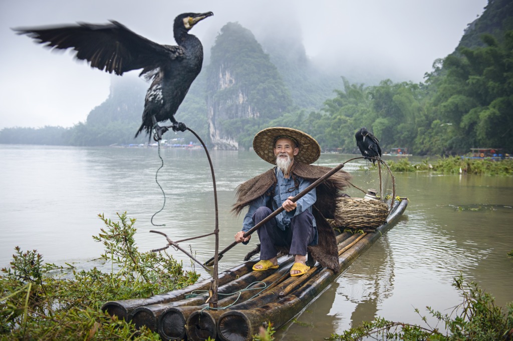 Cormorant Fisherman and His Bird jigsaw puzzle in People puzzles on TheJigsawPuzzles.com