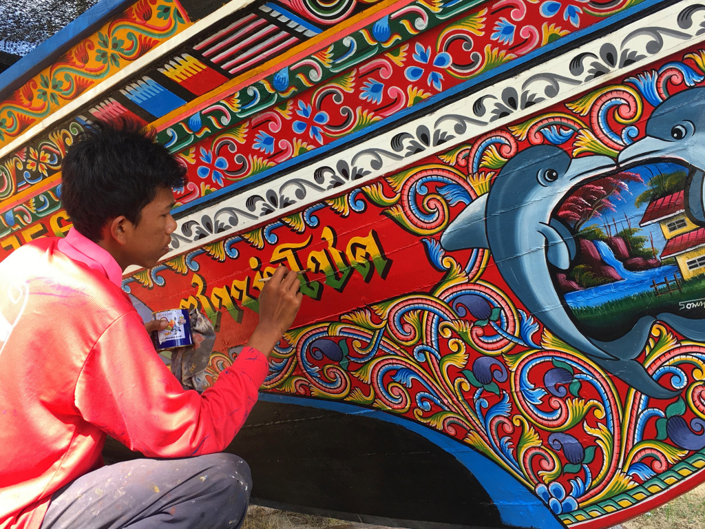 Ein Junge malt ein thailändisches Fischerboot jigsaw puzzle in Menschen puzzles on TheJigsawPuzzles.com