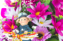 Fabric Flowers and Little Boy Doll