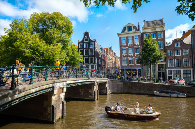 Canal with Boats in Amsterdam jigsaw puzzle in Bridges puzzles on ...