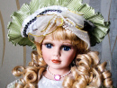 Porcelain Doll in a Beautiful Hat