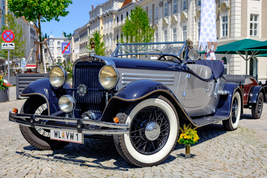 Vintage Cabriolet at the Main Square, Steyr, Austria jigsaw puzzle in Cars & Bikes puzzles on TheJigsawPuzzles.com