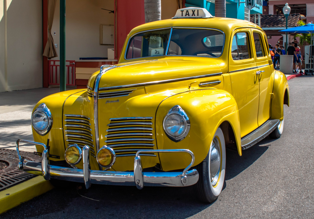 Yellow Vintage Taxi in Orlando, Florida jigsaw puzzle in Cars & Bikes puzzles on TheJigsawPuzzles.com