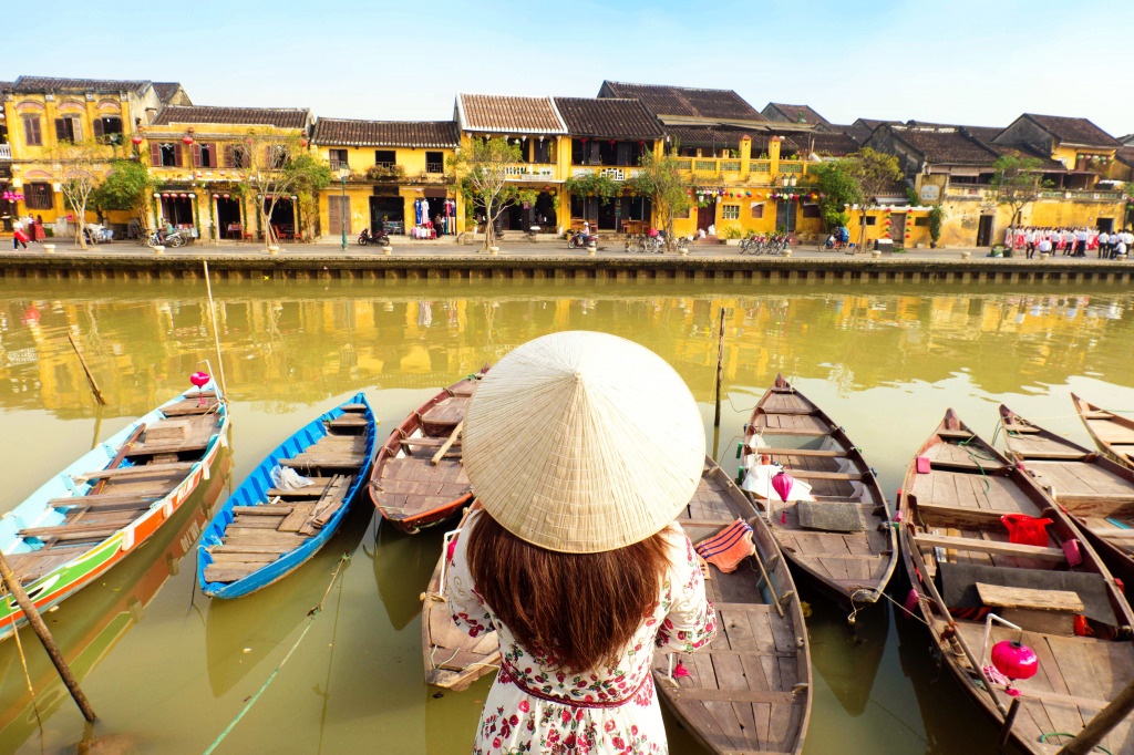 A Tourist in Hoi An Old Town, Vietnam jigsaw puzzle in Street View puzzles on TheJigsawPuzzles.com