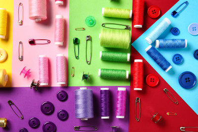 Spools, Buttons and Safety Pins on Colored Background jigsaw puzzle in ...