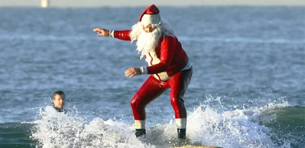 Surfing Santa jigsaw puzzle in Peter puzzles on TheJigsawPuzzles.com