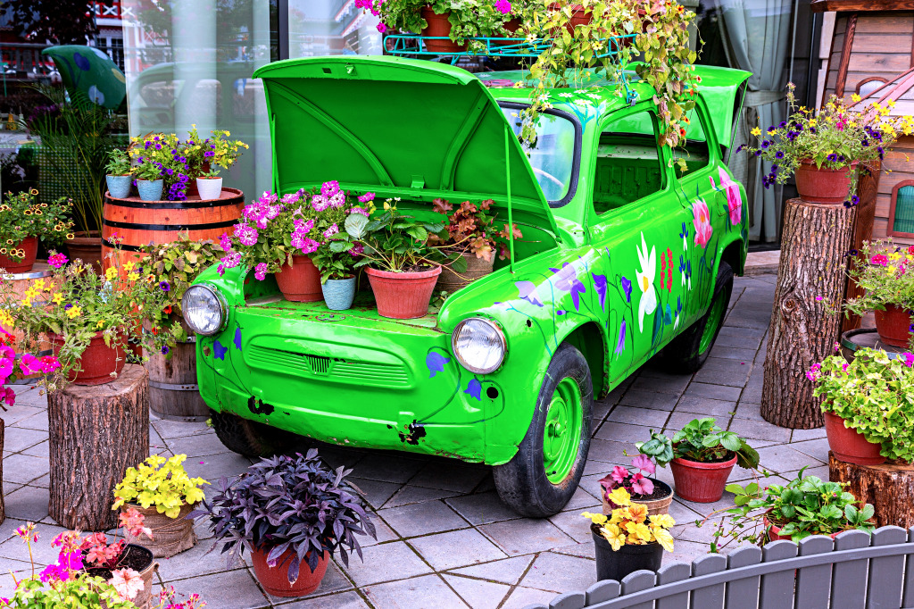Flores com um carro retro verde jigsaw puzzle in Carros & Motos puzzles on TheJigsawPuzzles.com