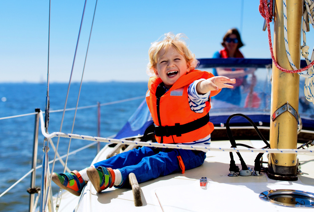 Little Boy Enjoys Yachting jigsaw puzzle in People puzzles on TheJigsawPuzzles.com
