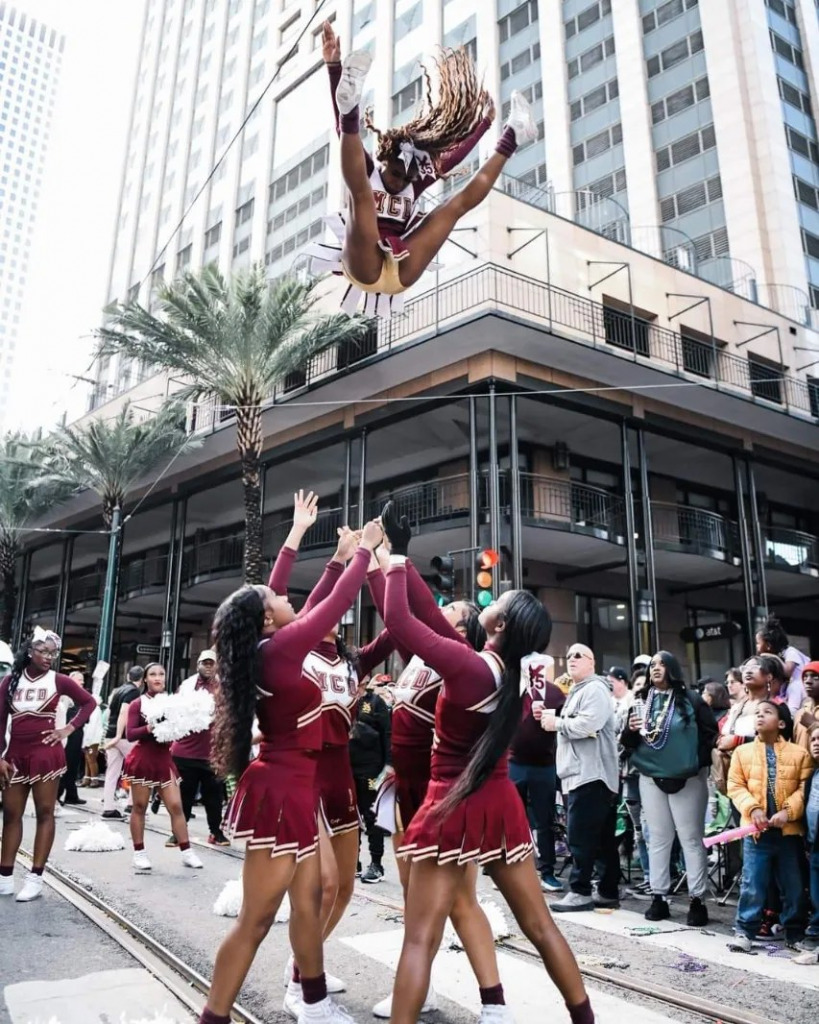 Cheerleaders Flying High in New Orleans jigsaw puzzle in Wanda A. Romain puzzles on TheJigsawPuzzles.com