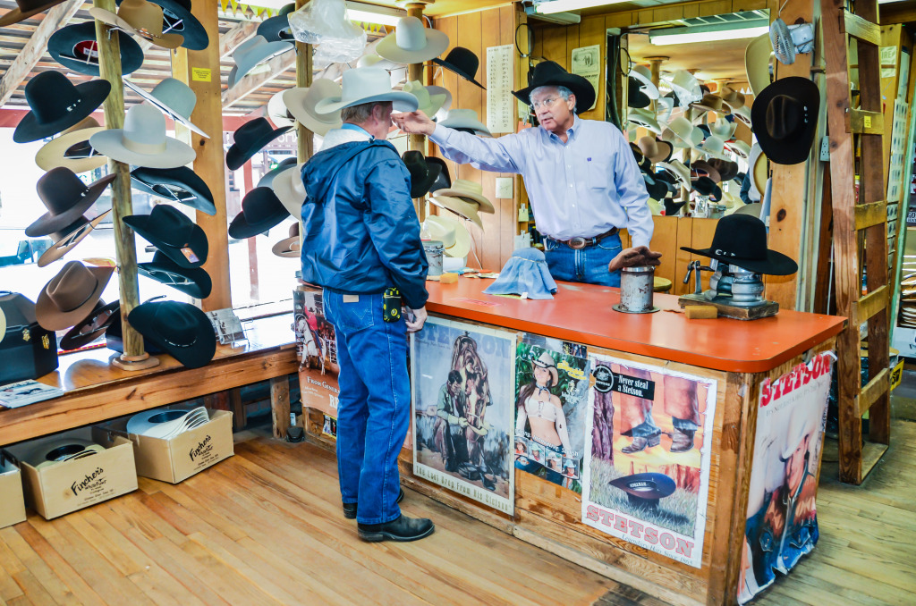 Cowboy Purchasing a Stetson Hat, USA jigsaw puzzle in People puzzles on TheJigsawPuzzles.com