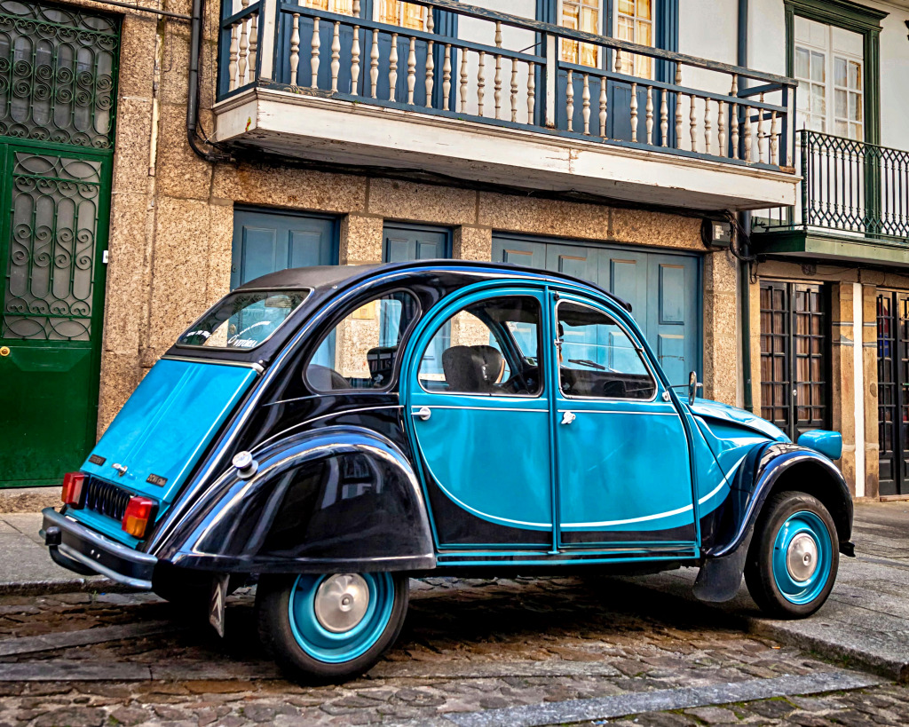 Citroen 2CV in the Alleys of Guimaraes, Portugal jigsaw puzzle in Cars & Bikes puzzles on TheJigsawPuzzles.com