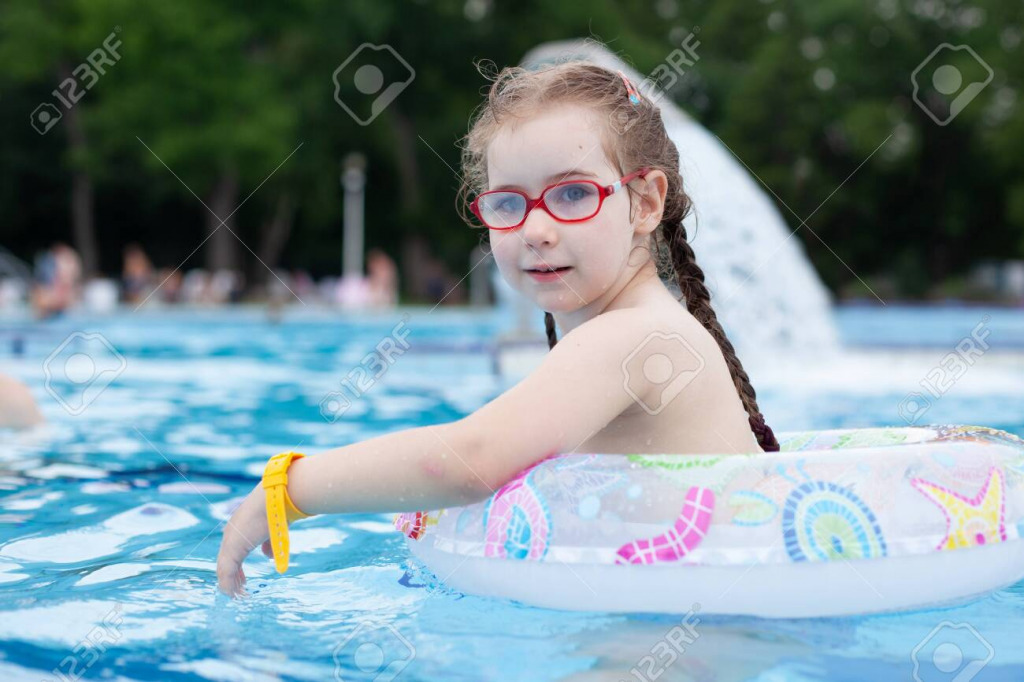 154058298-girl-with-glasses-swimming-in-the-pool jigsaw puzzle in PJ Hunter puzzles on TheJigsawPuzzles.com