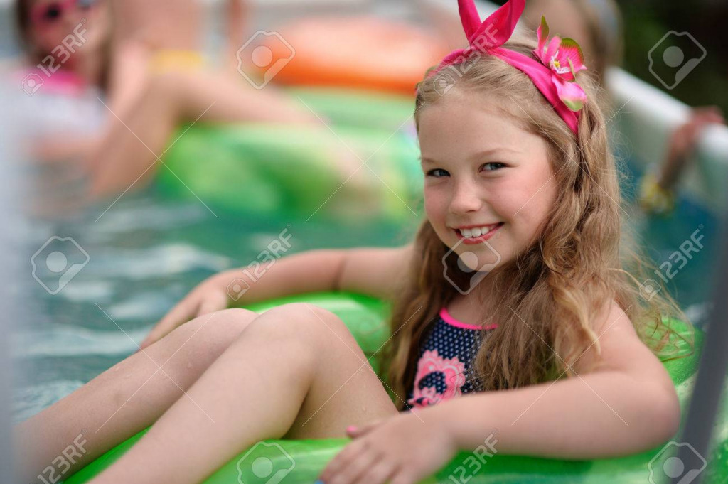 74893273-portrait-of-little-girl-in-tropical-style-in-a-swimming-pool jigsaw puzzle in PJ Hunter puzzles on TheJigsawPuzzles.com