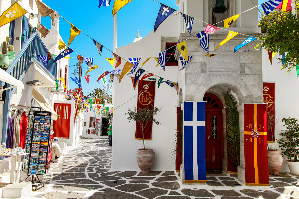 Flag-Decorated Street, Mykonos, Greece jigsaw puzzle in Street View puzzles on TheJigsawPuzzles.com