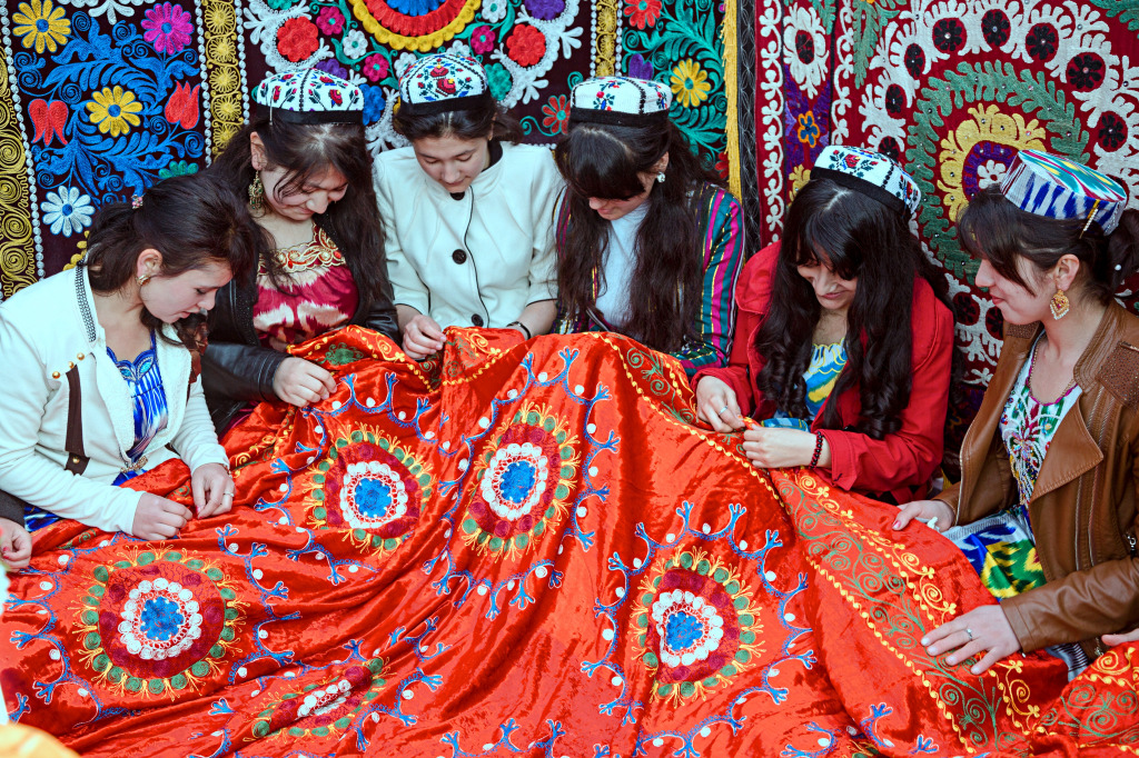 Girls Embroider a Carpet in Tajikistan jigsaw puzzle in People puzzles on TheJigsawPuzzles.com