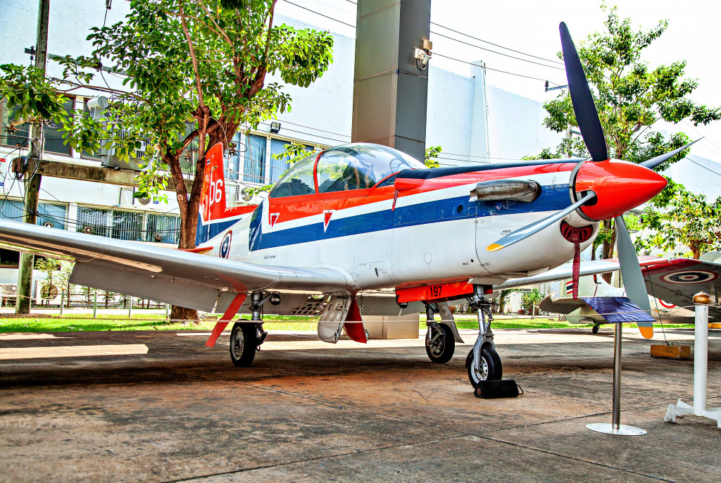 Old Pilatus PC-9 in Bangkok, Thailand jigsaw puzzle in Aviation puzzles on TheJigsawPuzzles.com