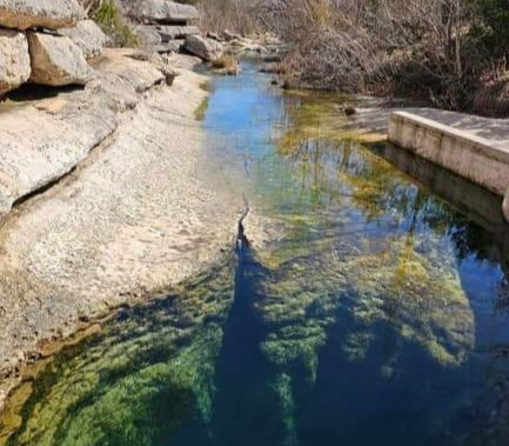 Jacob's Well, Wimberly TX jigsaw puzzle in Valerie M Griffin puzzles on TheJigsawPuzzles.com