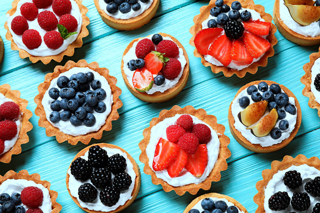 Berry Tarts on a Blue Wooden Table jigsaw puzzle in Food & Bakery puzzles on TheJigsawPuzzles.com