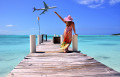 Young Woman on Wooden Pier in Exuma, Bahamas