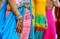 Henna Tattooed Hands of a Young Girl in a Sari