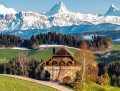 Traditional Bernese Farmhouse and the Schreckhorn