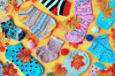 Colorful Children's Socks on a Yellow Background