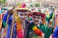 A Festive Procession in Folk Costumes and Masks