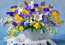 A Bouquet of Spring Wildflowers in a Cup