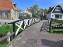 Canal Bridge In Dutch Fishing Village
