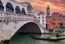 Gondola Ride under the Rialto Bridge at Sunset