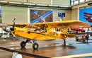 Yellow Piper J3 Cub in Friedrichshafen, Germany