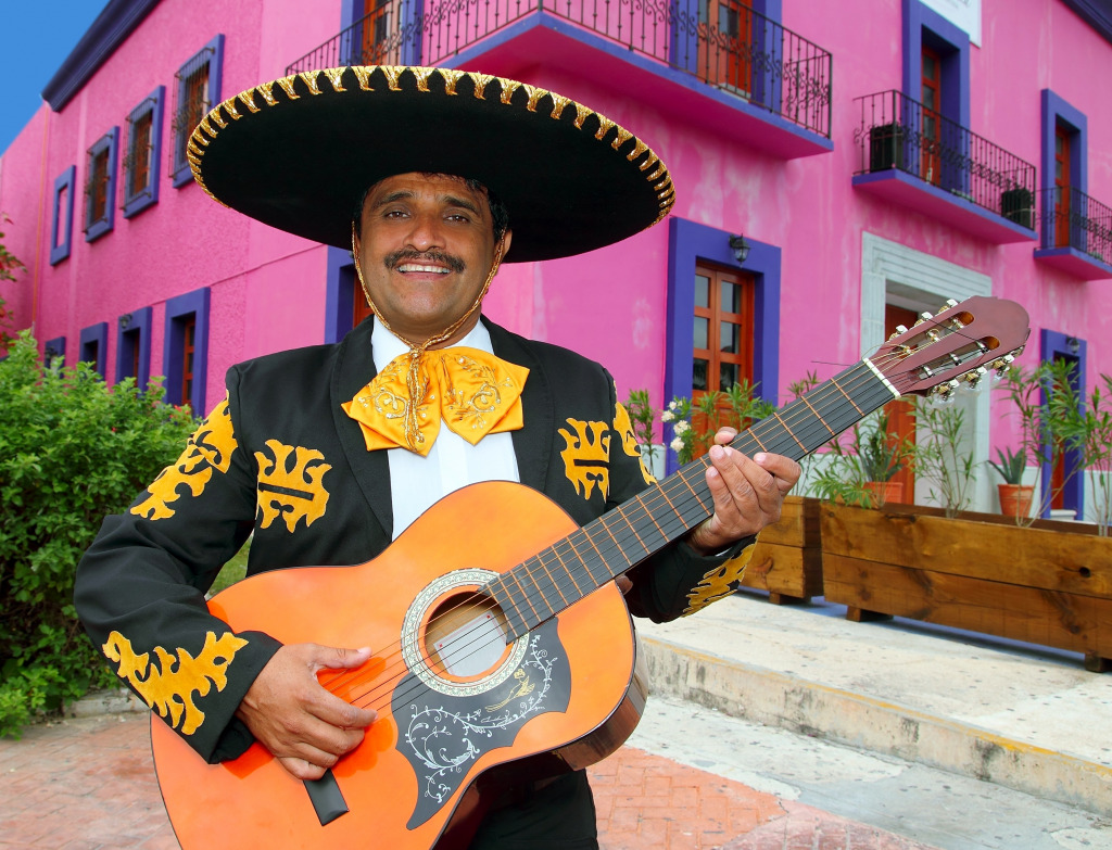 A Mariachi Singer Playing Guitar in Mexico jigsaw puzzle in People puzzles on TheJigsawPuzzles.com