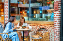 Young Women at a Street Cafe