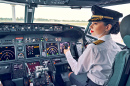 Female Co-Pilot in the Cockpit of an Airplane