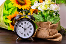 Still life with a Vintage Alarm Clock and Flowers